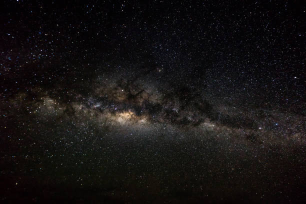 istock Deep space background with stardust and shining star. Milky way cosmic background. Image noise due to high ISO 1128182662