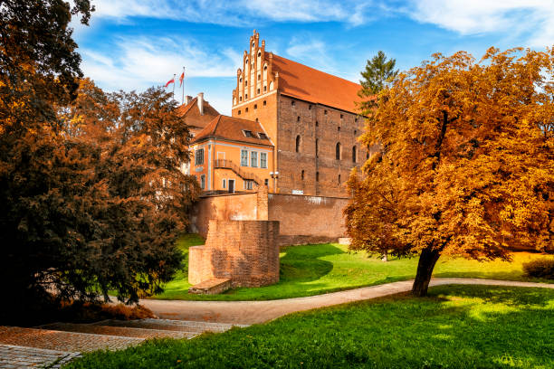 Olsztyn, Poland - August 31, 2018: Castle of Warmian Bishops in Olsztyn, Poland. The castle built in the fourteenth-century in the Gothic architectural style. The most well-known administrator was Nicolaus Copernicus between 1516 and 1521