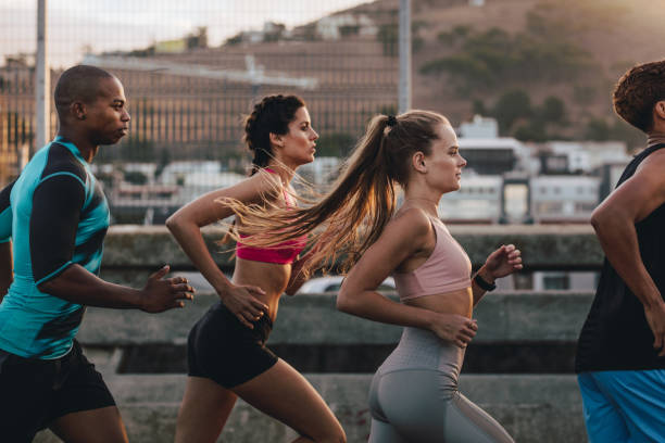 istock Group of runners training together in morning 1128184323