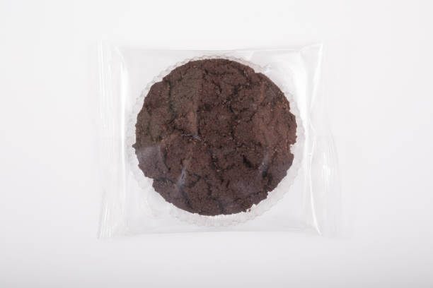 istock Oatmeal cookie in a plastic pack on a white 1128184560