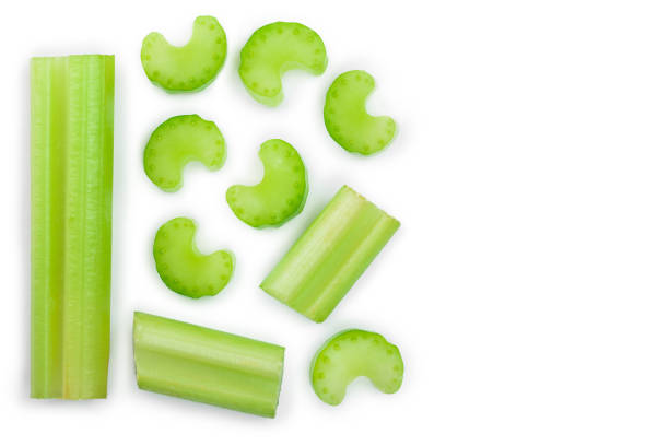istock fresh celery isolated on white background with copy space for your text.Top view. Flat lay 1128185941
