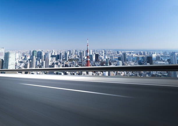 istock Empty asphalt road with modern cityscape 1128187249