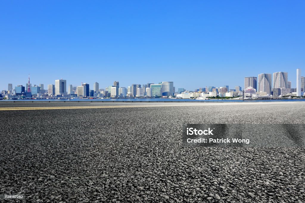 Empty asphalt road with modern cityscape Asia, Japan, Tokyo - Japan, Architecture, Asphalt Tokyo - Japan Stock Photo
