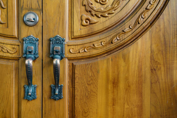 istock Handle and lock of wooden door 1128188698
