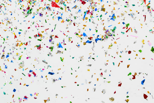 istock colorful glitter and confetti on white background 1128191006