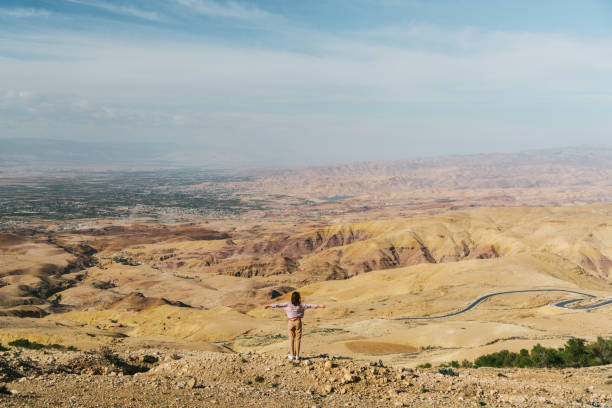 istock Woman looking at view from Mount Nebo 1128191111