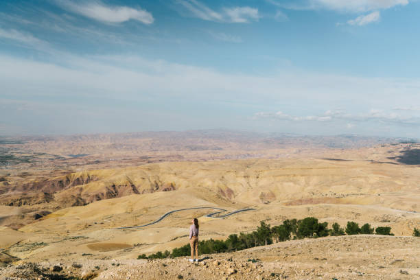 istock Woman looking at view from Mount Nebo 1128191139