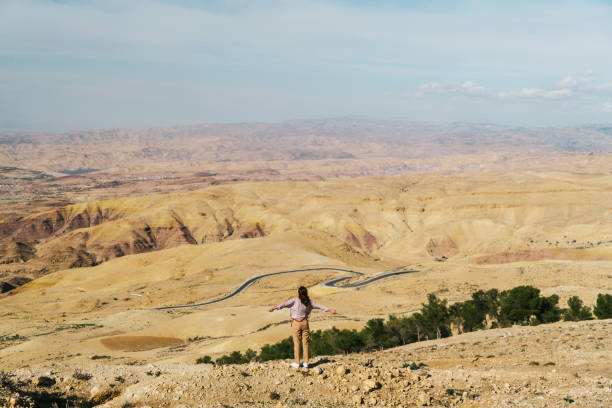 istock Woman looking at view from Mount Nebo 1128191154