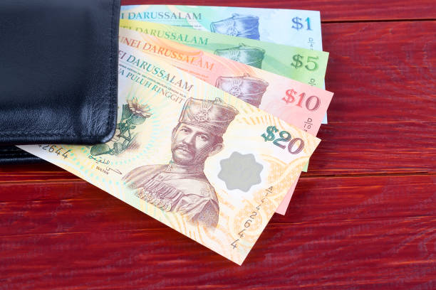 istock Money from Brunei in the black wallet 1128191272