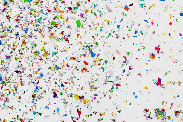 istock colorful glitter and confetti on white background 1128192428
