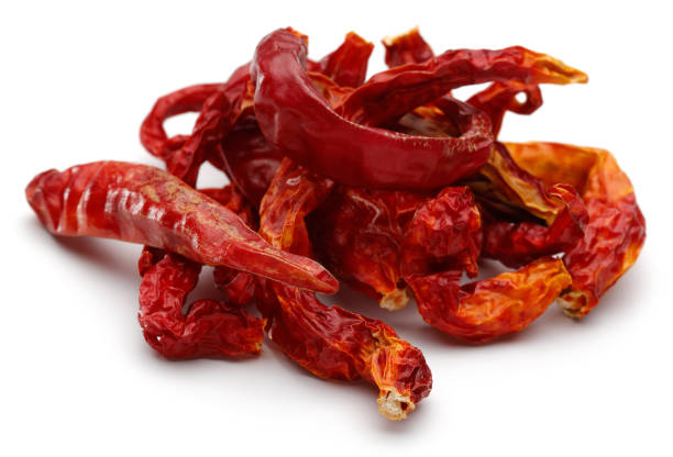 istock Heap of dry red peppers isolated 1128194548