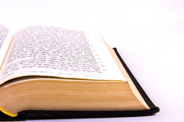 istock Opened hebrew Bible, isolated on white background 1128194870