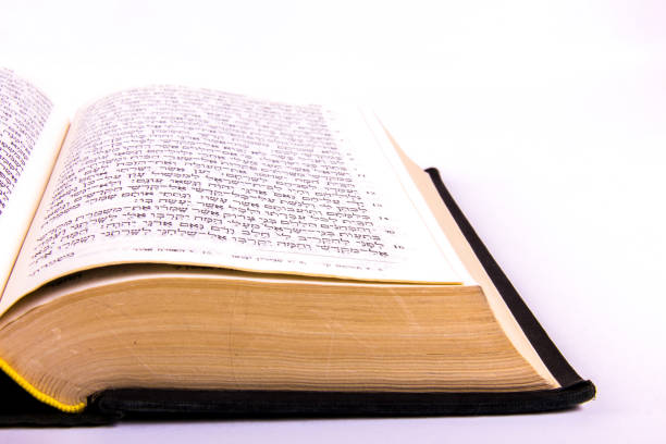 istock Opened hebrew Bible, isolated on white background 1128194874