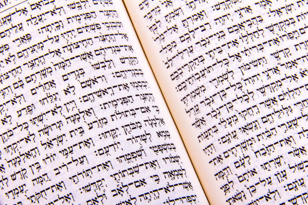 istock Opened hebrew Bible, isolated on white background 1128194879