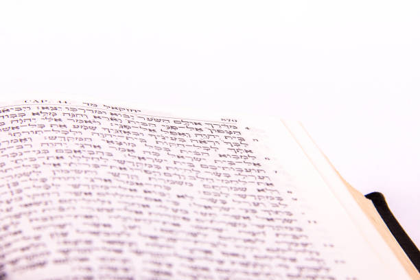 istock Opened hebrew Bible, isolated on white background 1128195826