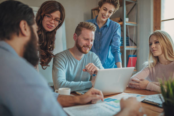 istock Young business people working in office 1128196321