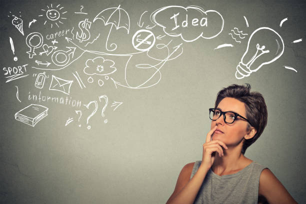 istock woman thinking dreaming has many ideas 1128196524