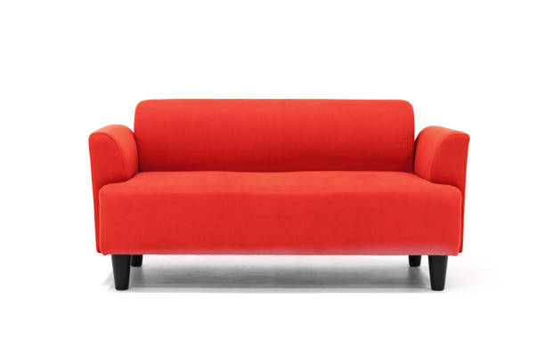 istock Red Scandinavian style contemporary sofa on white background with modern and minimal furniture design for stylish living room. 1128198691