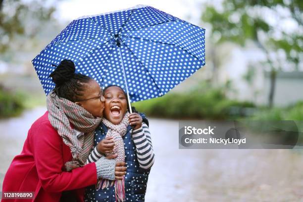 Rain Wont Spoil Our Day Stock Photo - Download Image Now - Umbrella, Family, Rain