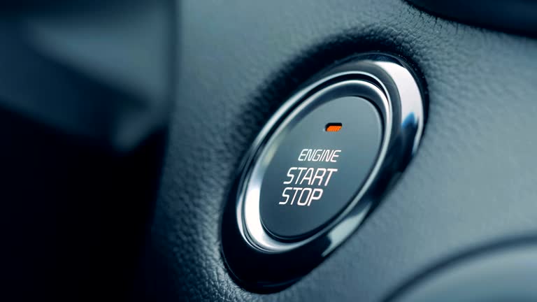 Ignition of car engine by pushing a button