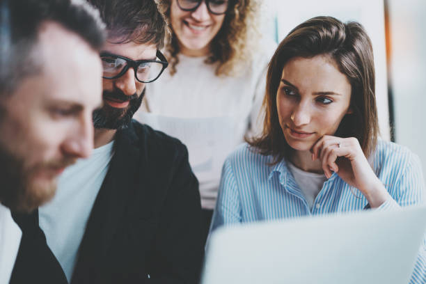 istock Business Project team working together at sunny meeting room at office.Brainstorming process concept.Horizontal.Blurred background 1128203071