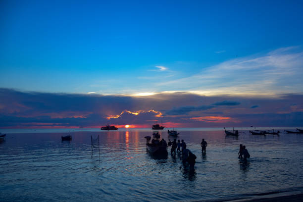 istock Night divers silhouette , Koh Tao , Thailand 1128203644