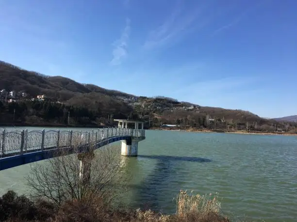 Scenery of the villages seen from the lake on a sunny day