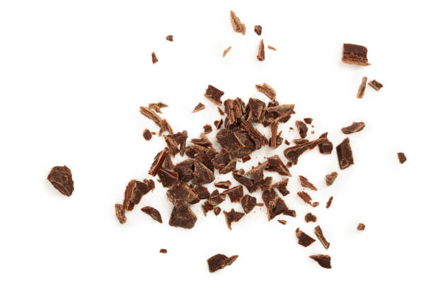 istock grated chocolate isolated on white background. Top view 1128209207