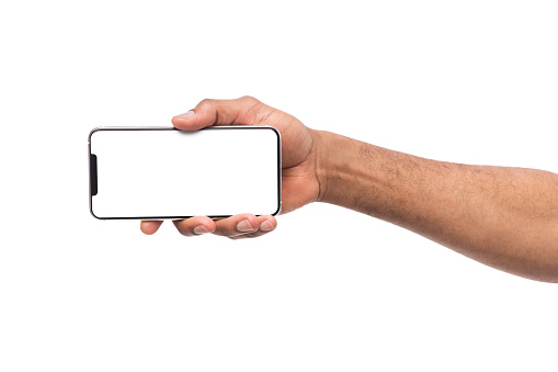 Macho mano smartphone en orientación horizontal photo