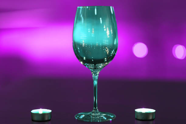 istock Wineglass and candles 1128212142