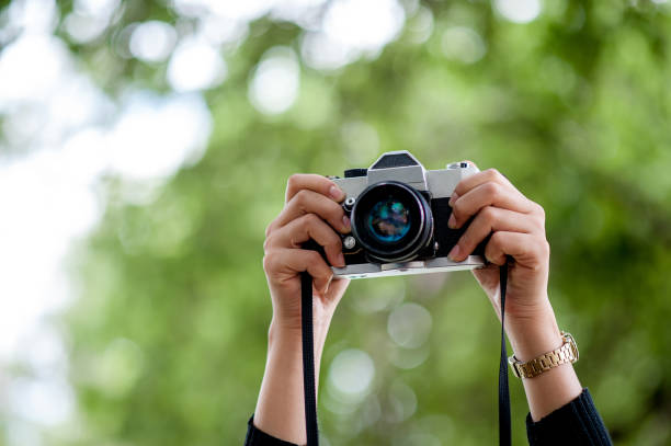 istock Hand and camera shots Photography concept With copy space 1128213205