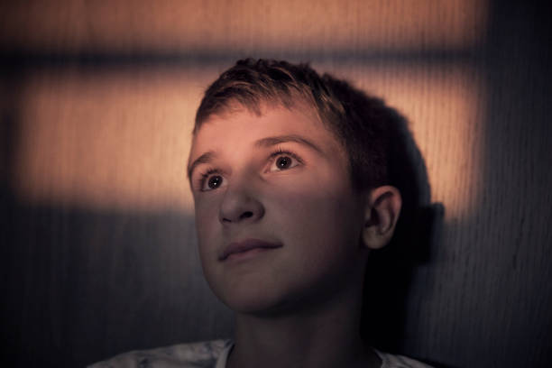 Teenager boy contemplating about his future
