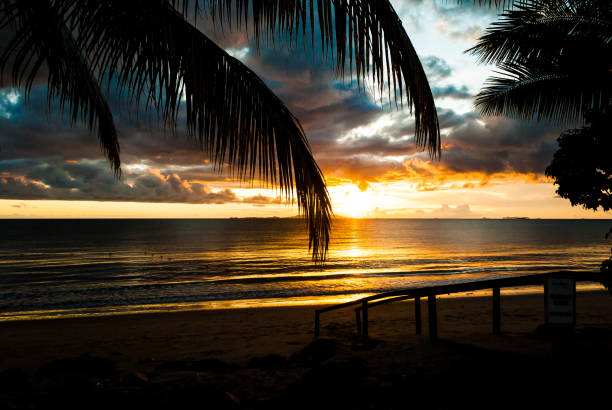 istock Enjoying sunset on a sandy exclusive beach 1128215968