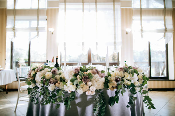 istock Wedding table for brides decorated with fresh flowers 1128216060
