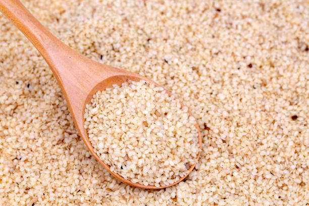 istock Sesame seeds isolated on white background top view 1128217063