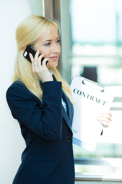 istock successful businesswoman talking on a cellphone 1128217703