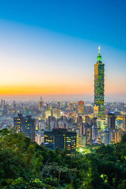 istock Illuminated Buildings In City Against Sky 1128221357