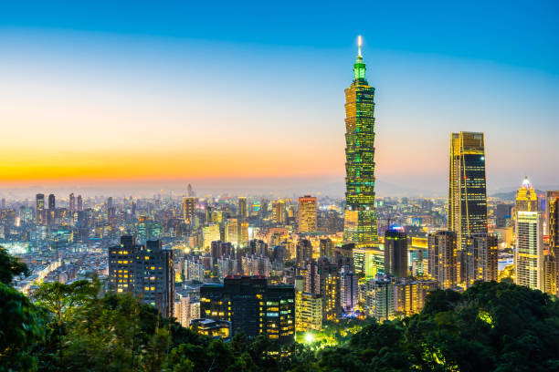 istock Illuminated Buildings In City Against Sky 1128221363
