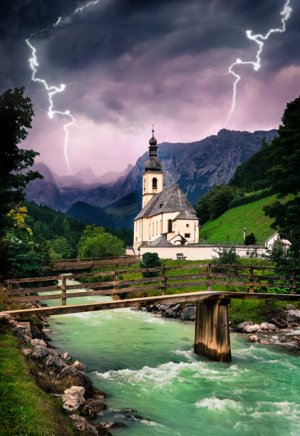 Ramsau Church in Bergen Bavaria Church in the Alps gewitter stock pictures, royalty-free photos & images