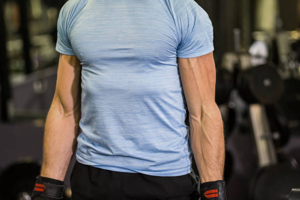 istock Image of a muscular man at the gym. 1128221415
