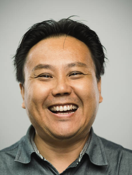 istock Real chinese mature man with very excited expression looking at camera 1128221811