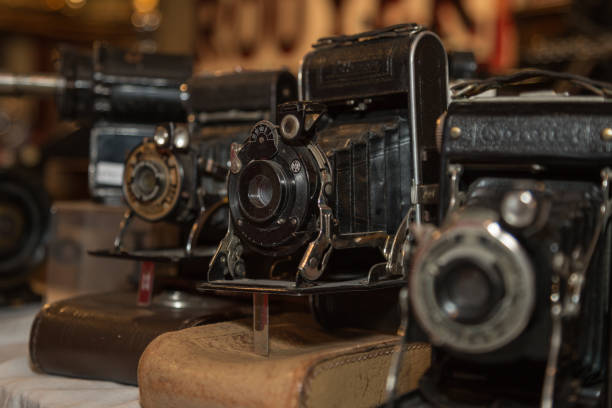 istock Ancient Folding Cameras with Bellows on their Leather Cases 1128226165