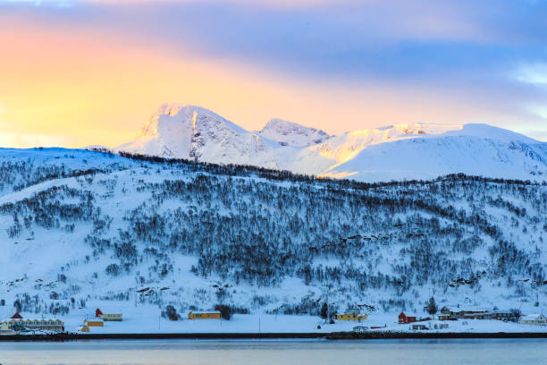 istock View on snowy mountain peaks during sunset 1128226750