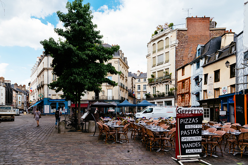 Rennes, France - July 23, 2018: Square with restaurant terraces in historic centre of the city. Rennes is the capital of the region of Brittany