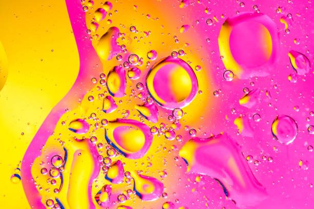 istock Abstract background with colorful gradient colors. Oil drops in water abstract psychedelic pattern image. Water bubbles abstract background. 1128231328