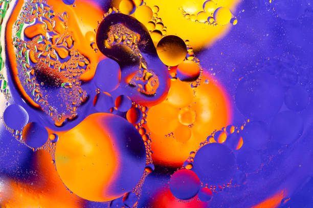 istock Abstract background with colorful gradient colors. Oil drops in water abstract psychedelic pattern image. Water bubbles abstract background. 1128231329