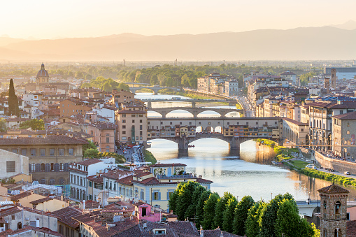 View of Florence in the evening light with the Ponte Vecchio bridge