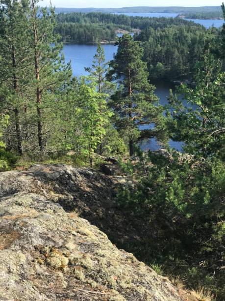 Lake Ladoga Красиво озеро Ладога и красивая природа, теплое лето, лодки, скалы, острова / Beautiful lake Ladoga and beautiful nature, warm summer, boats, rocks, Islands скала stock pictures, royalty-free photos & images