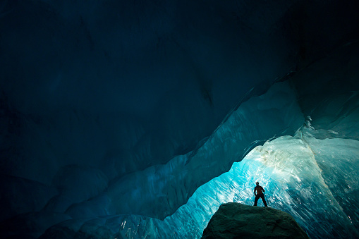 Exploring natures beauty in a glacial ice cave