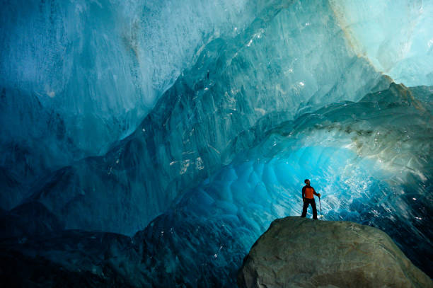 istock Exploring natures beauty in a glacial ice cave 1128233657